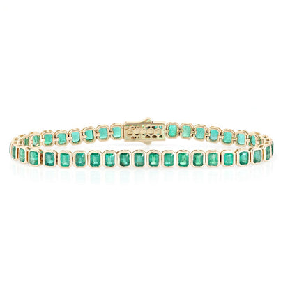 Emerald tennis bracelet in yellow gold