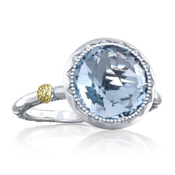 CRESCENT BEZEL RING FEATURING SKY BLUE TOPAZ